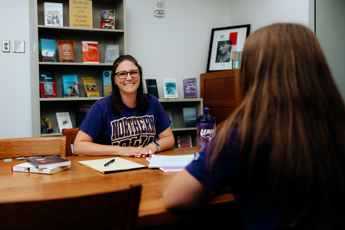 Student meeting with faculty member