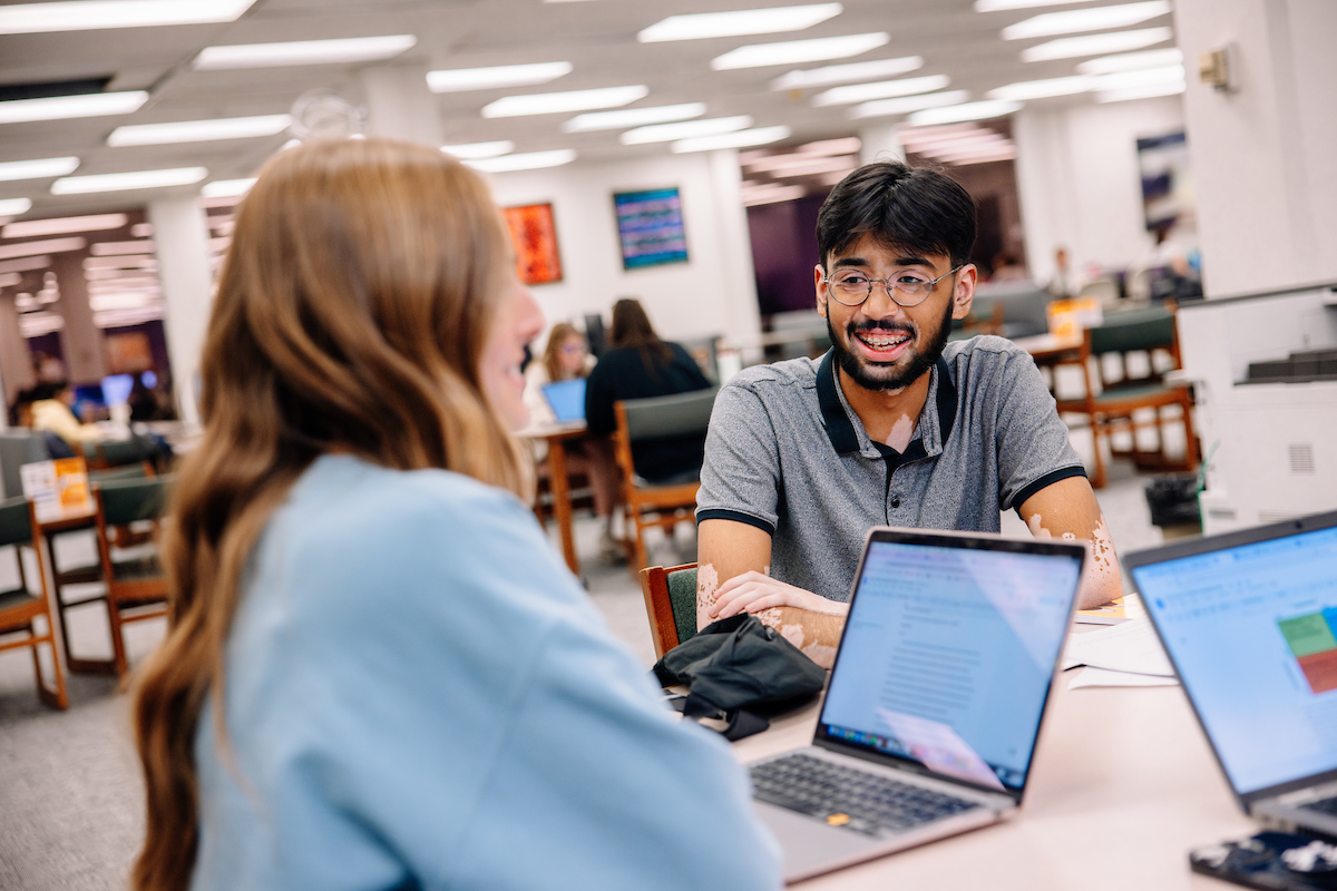 Students studying on laptops in Rod Library