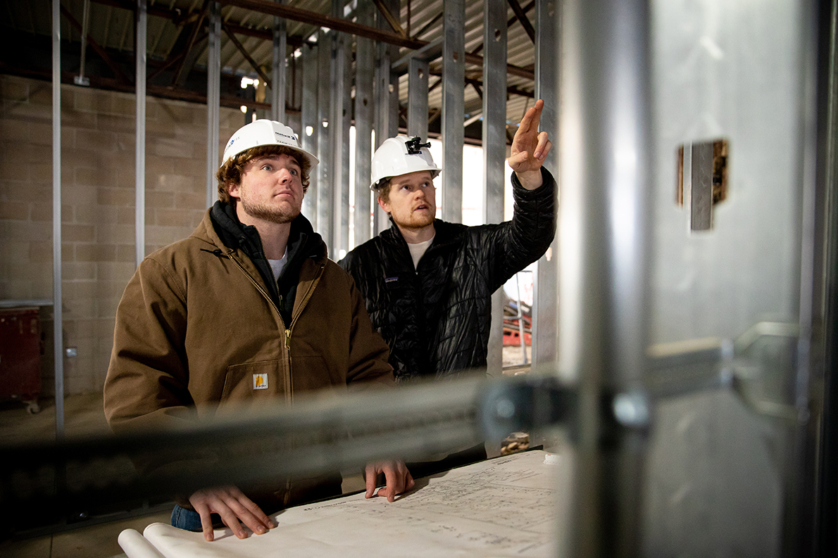 Student at construction site.