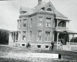Black and white image of President's House on UNI campus